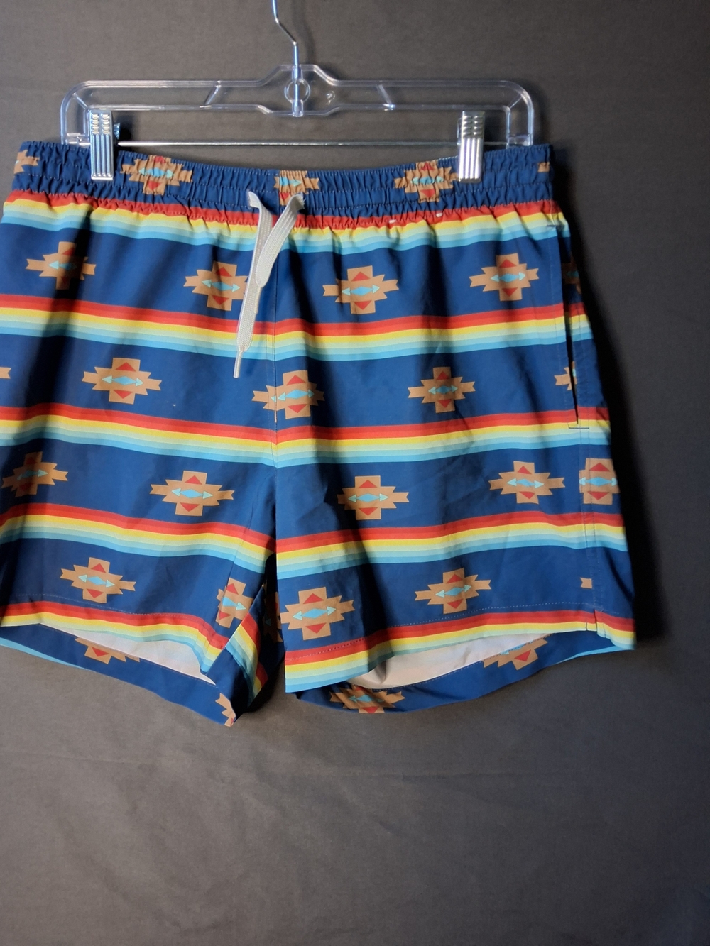 chubbies Navy Swim Trunks with Rainbow Stripes and Aztec Motif